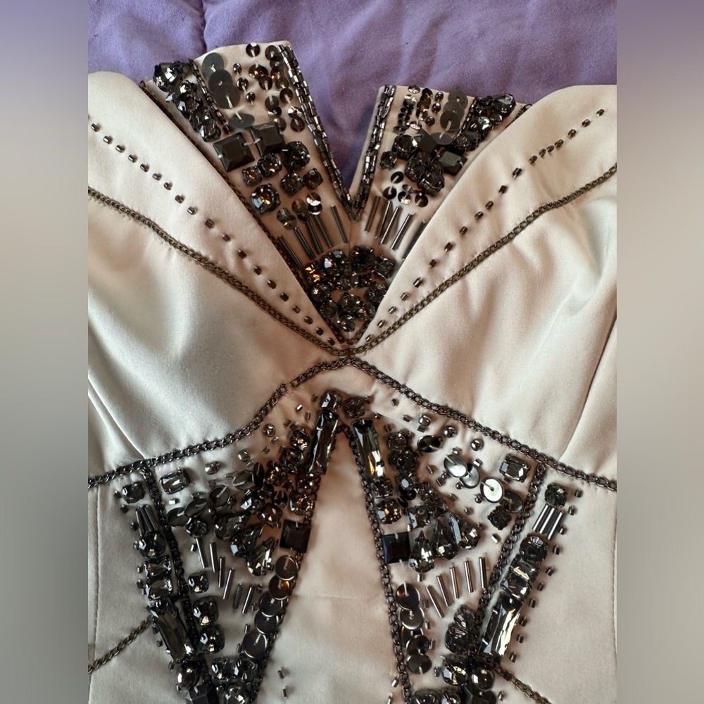 Faux Black diamonds and sequence dress has never been worn. Still has tags.